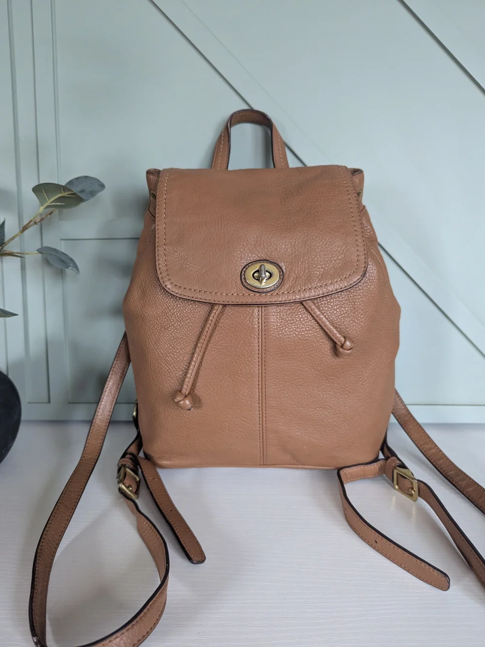Coach Pebbled Leather Drawstring Backpack in Tan